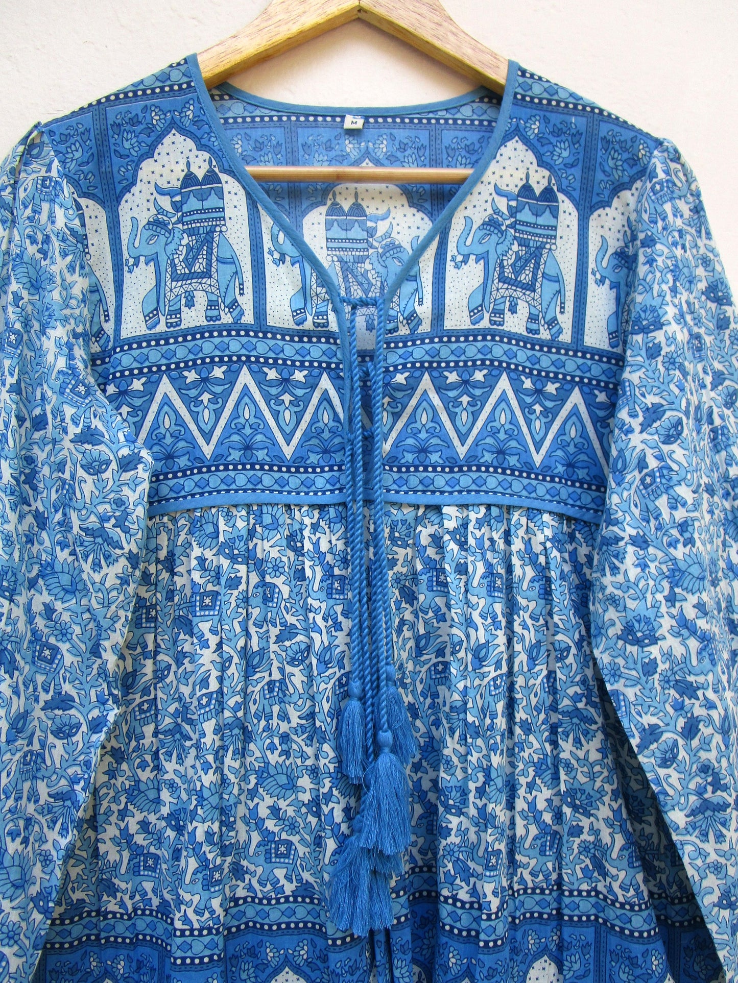 blue screen printed floral blouse with elephant print border