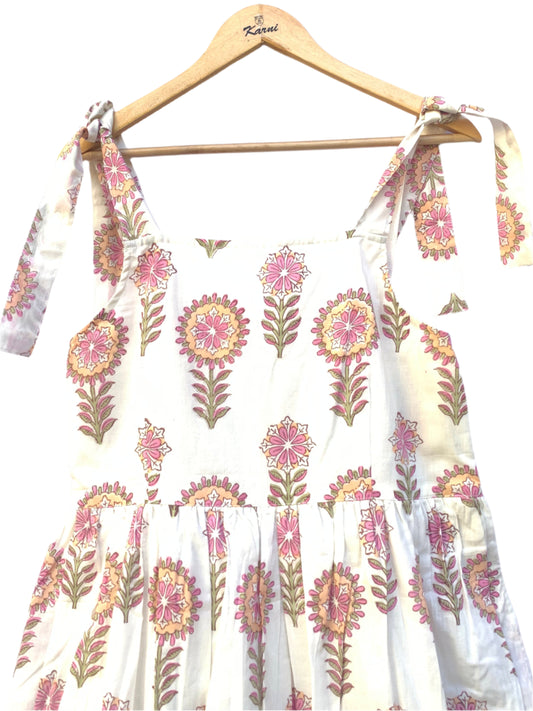 white knotty dress with big flower print in pink