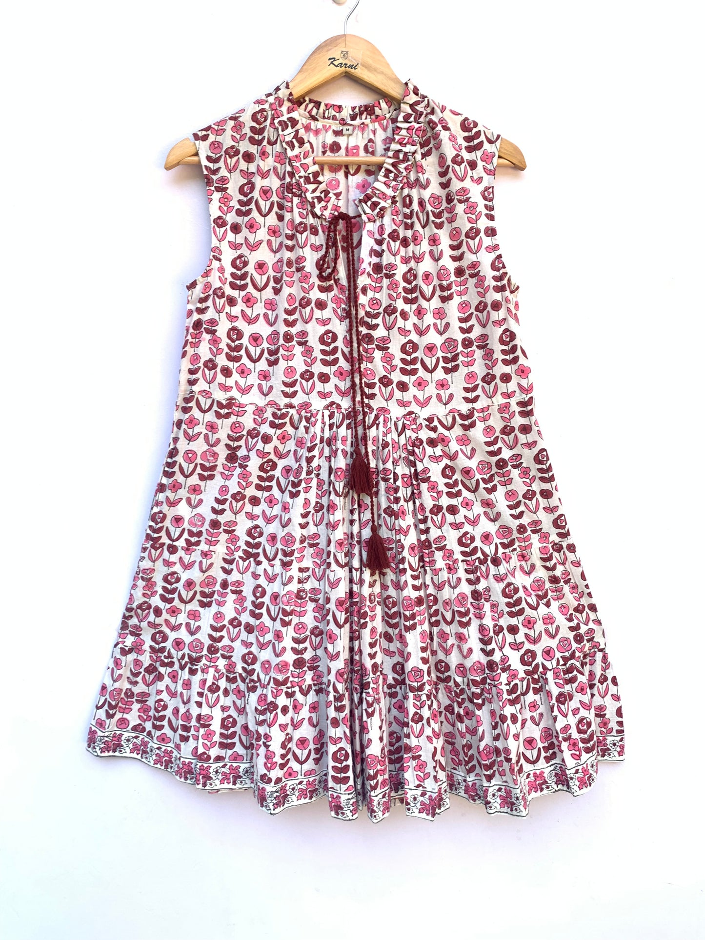 dainty pink and maroon floral dress with tassels