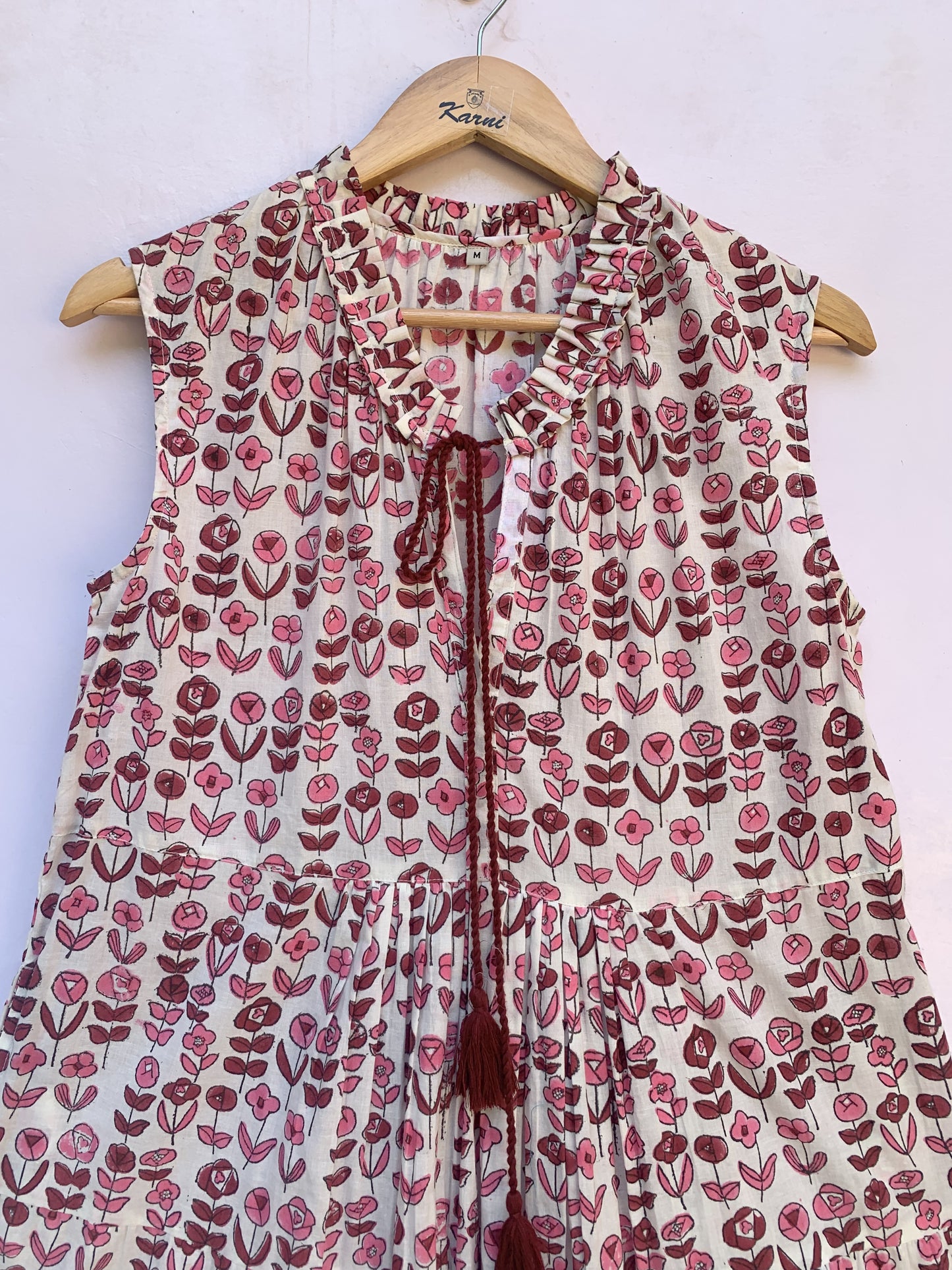 dainty pink and maroon floral dress with tassels