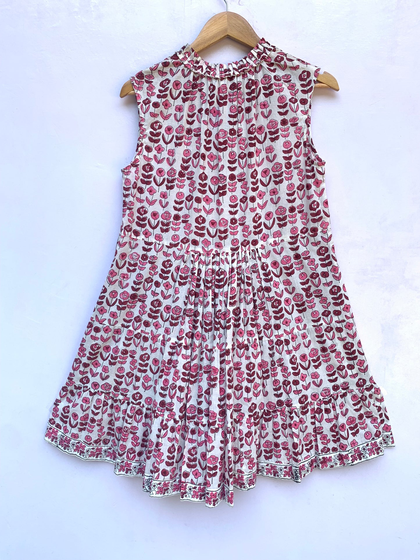 dainty pink and maroon floral dress with tassels