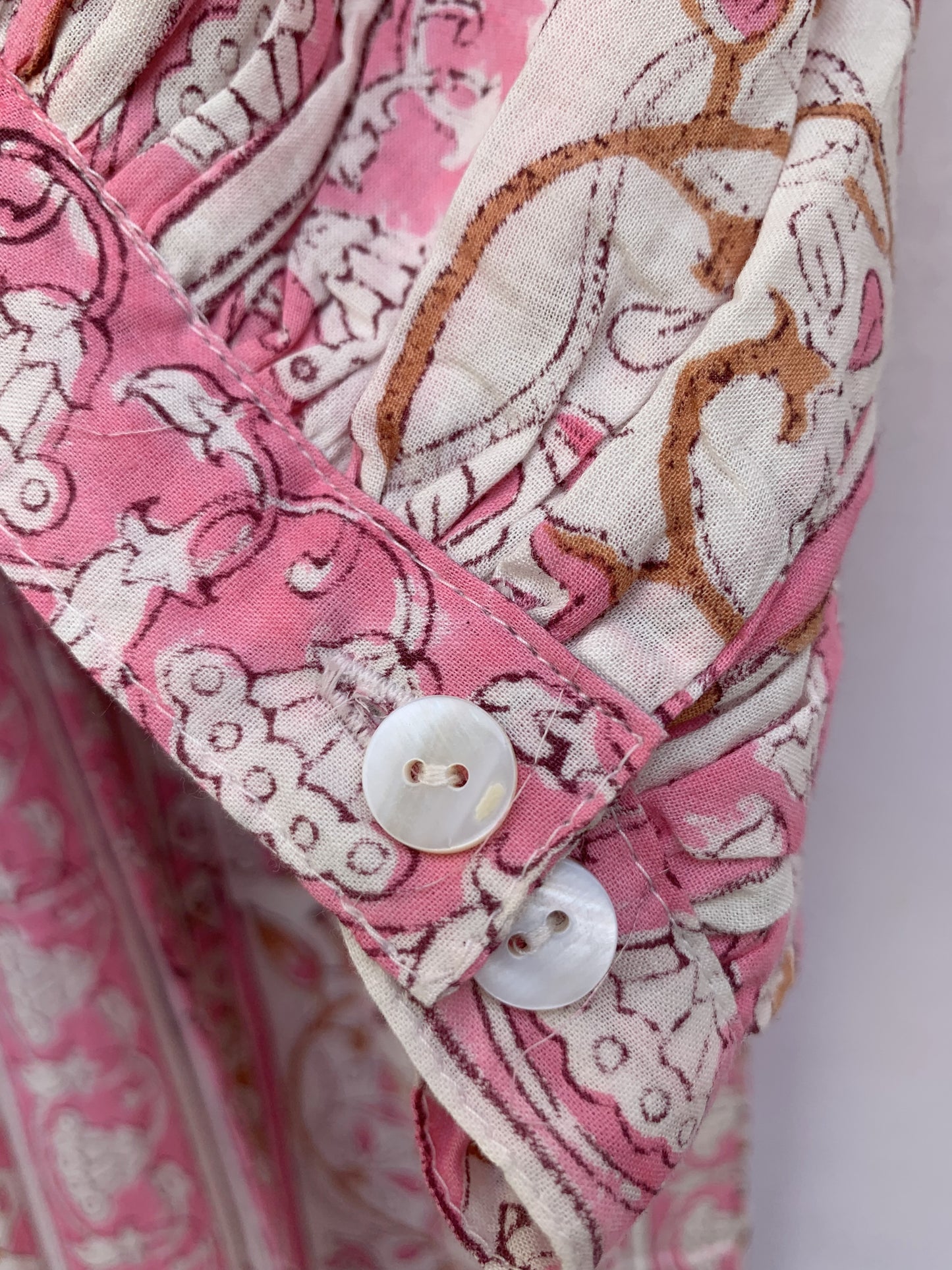 pretty pink floral striped mini dress with button sleeves