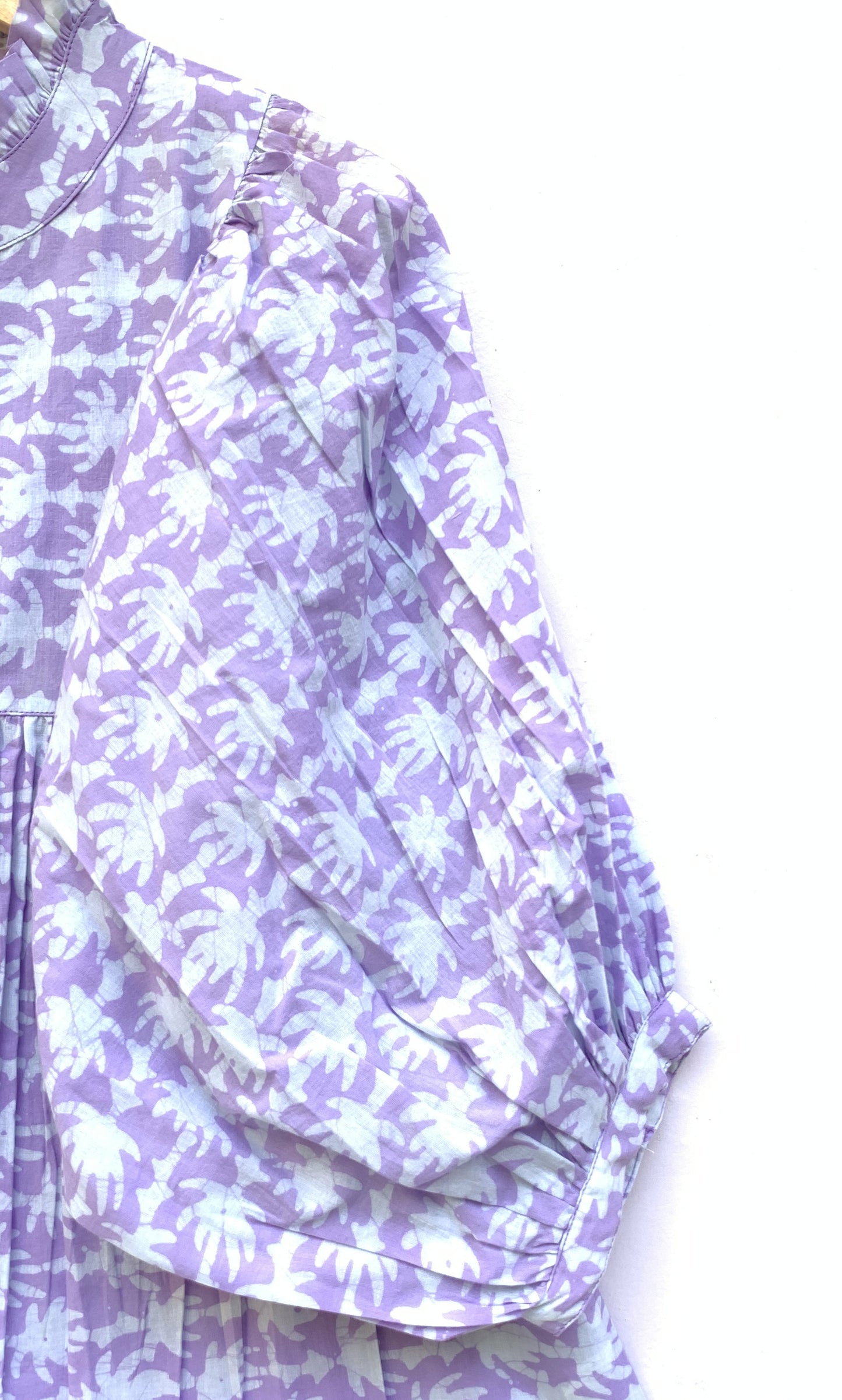 purple and white hand printed blouse with 3/4th sleeves