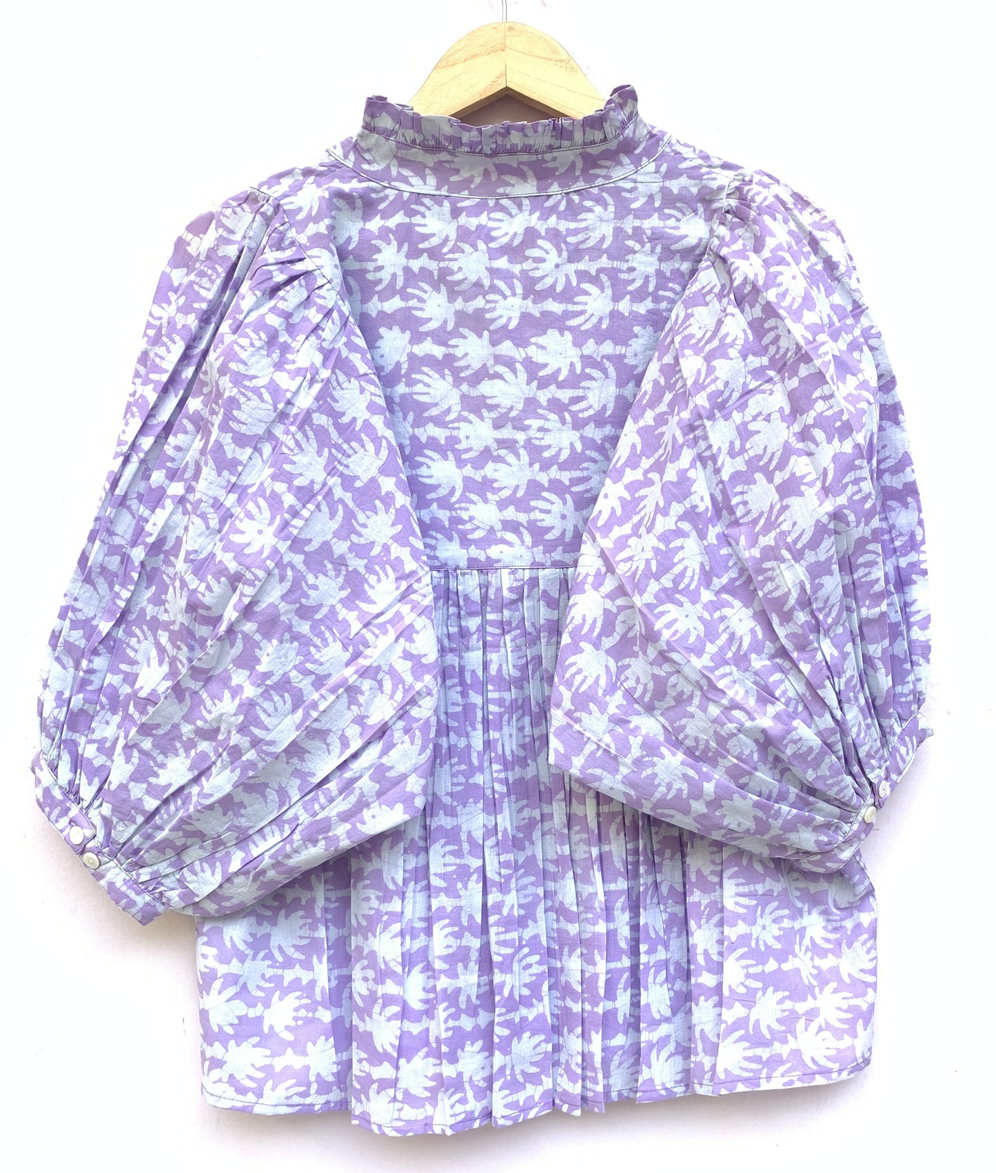 purple and white hand printed blouse with 3/4th sleeves