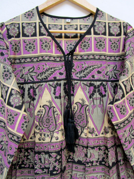 purple womens blouse with black and beige detailing