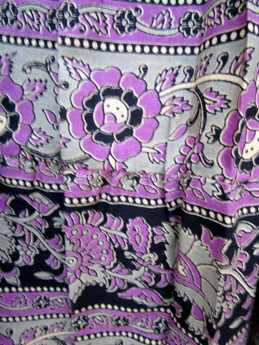 purple womens blouse with black and beige detailing