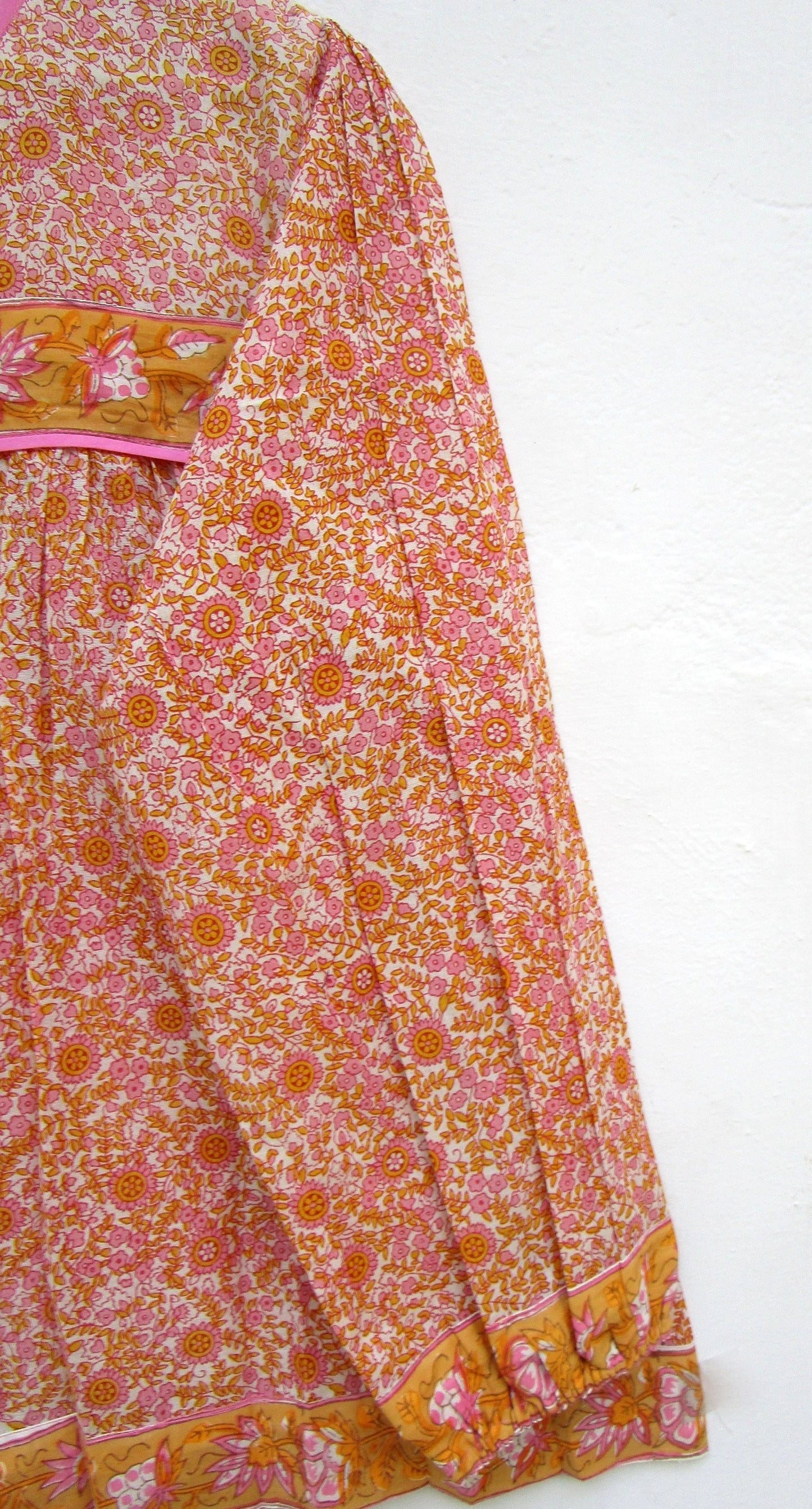 candy orange and pink floral screen printed blouse with tassels