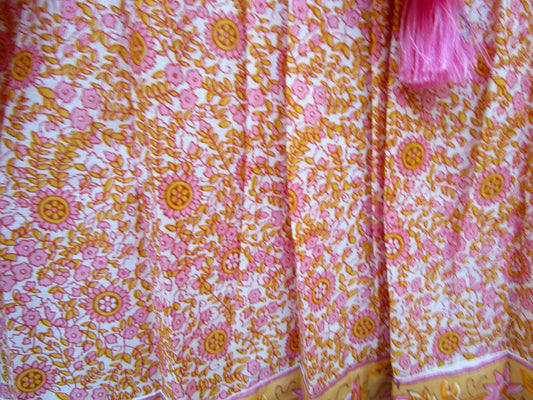 candy orange and pink floral screen printed blouse with tassels