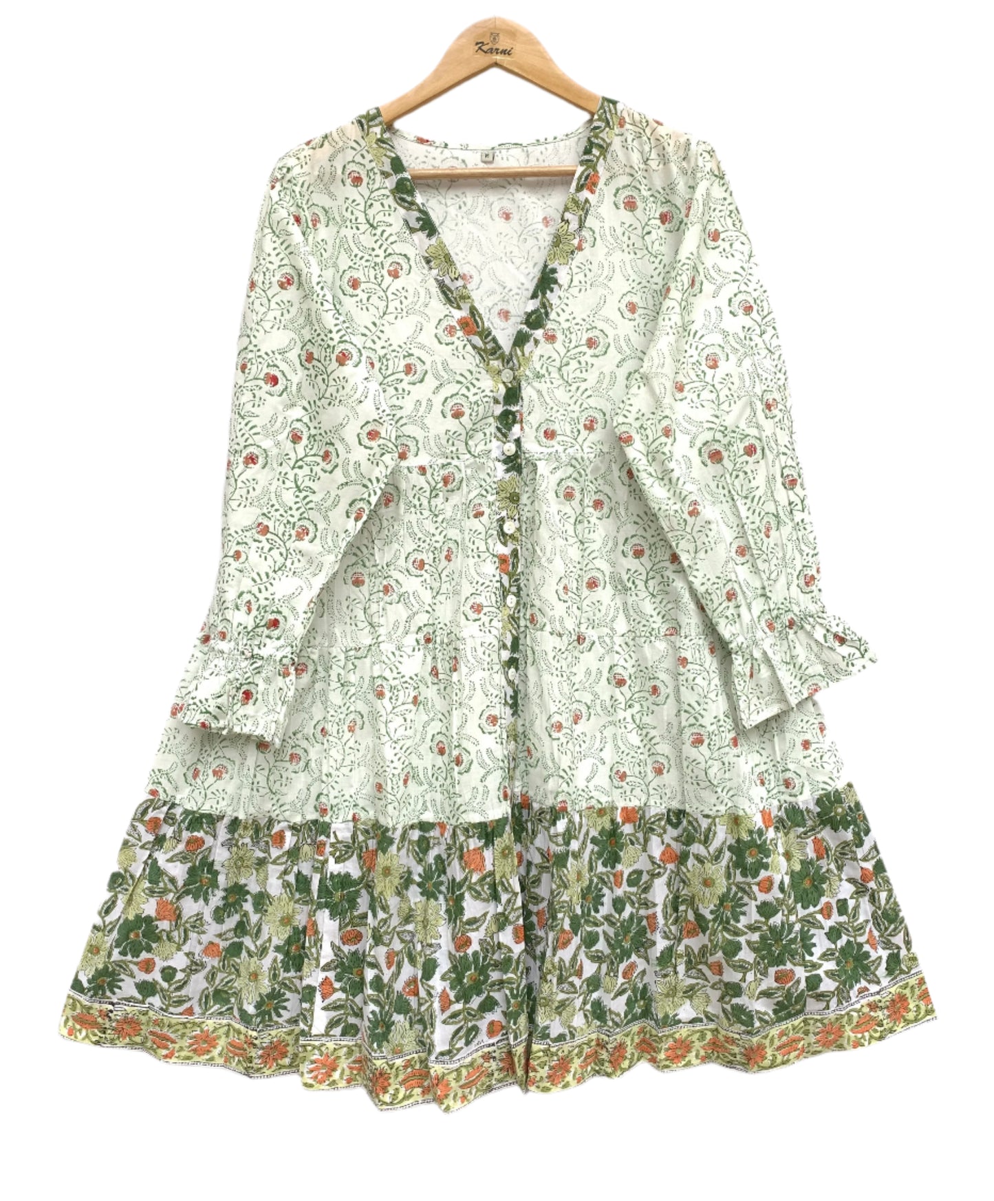 delicate green and white mini cotton dress with a vibrant border