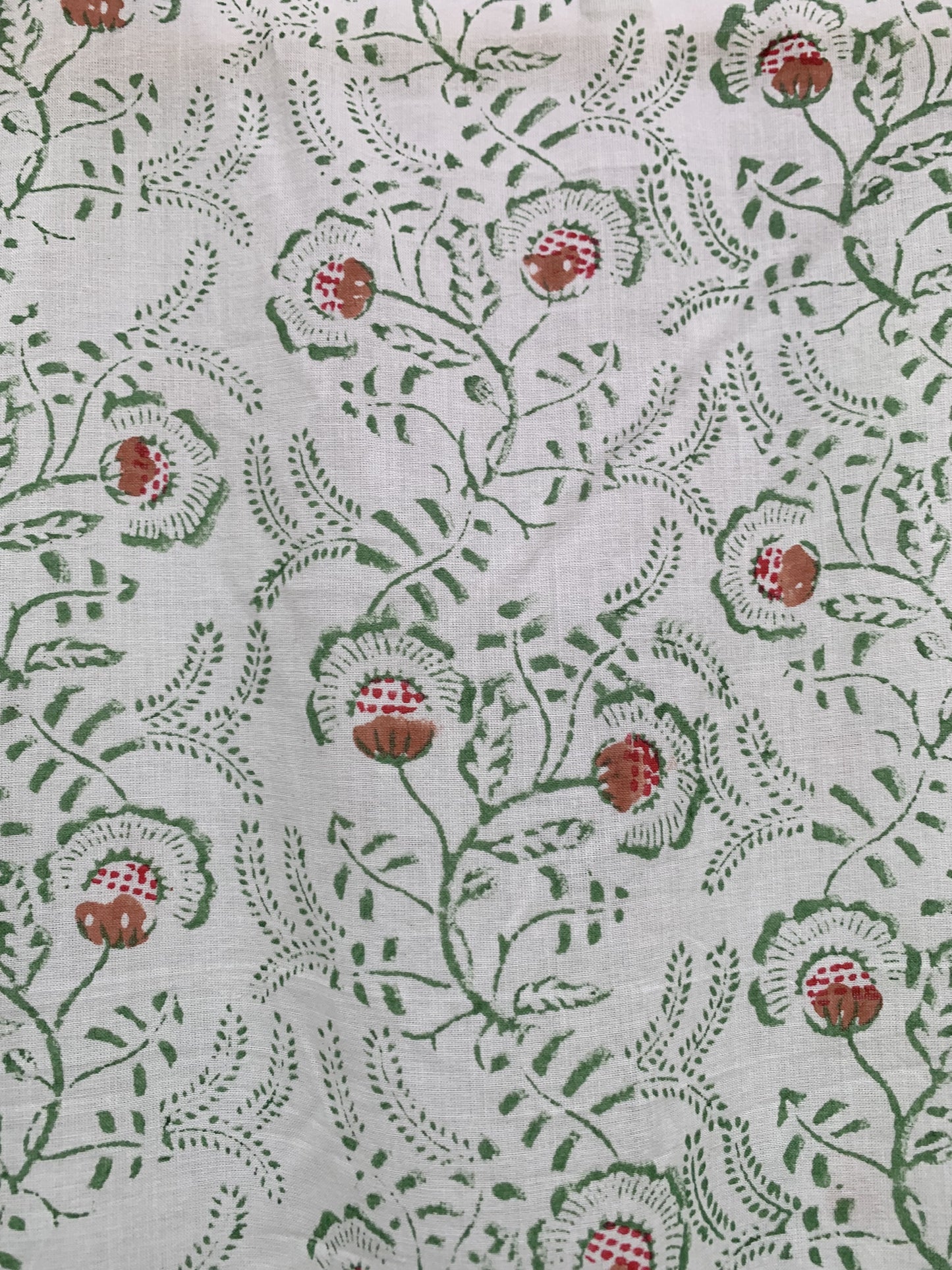 delicate green and white mini cotton dress with a vibrant border