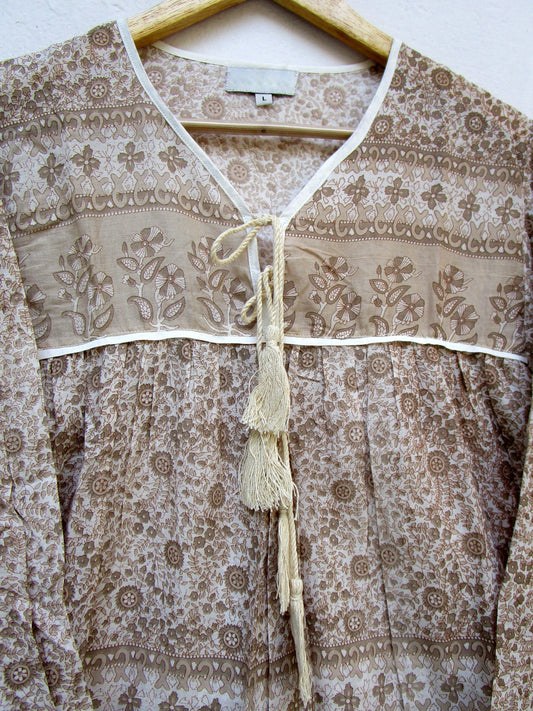 brown screen printed blouse for women with beige tassels