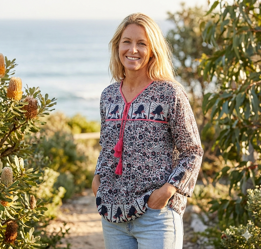 black small flower print blouse with tassels