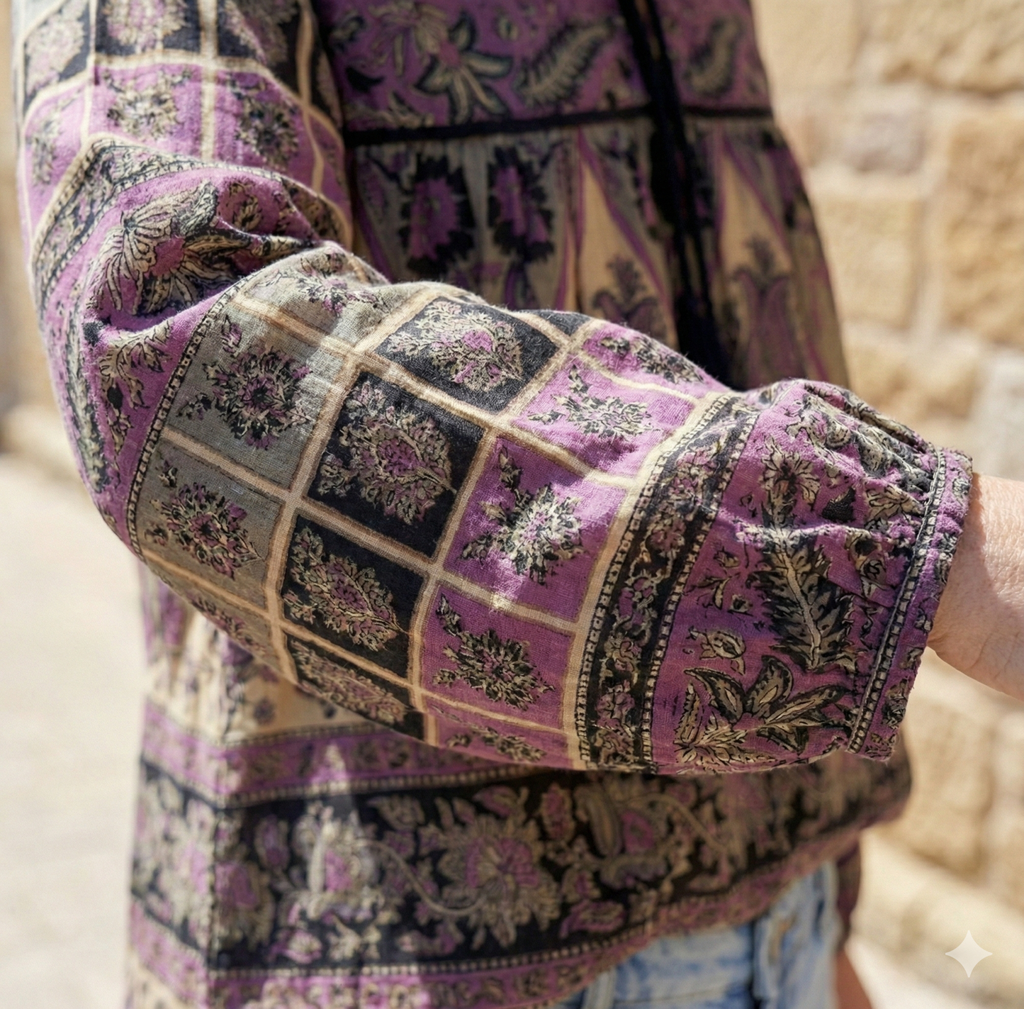 purple womens blouse with black and beige detailing