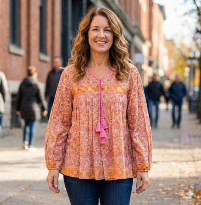 candy orange and pink floral screen printed blouse with tassels
