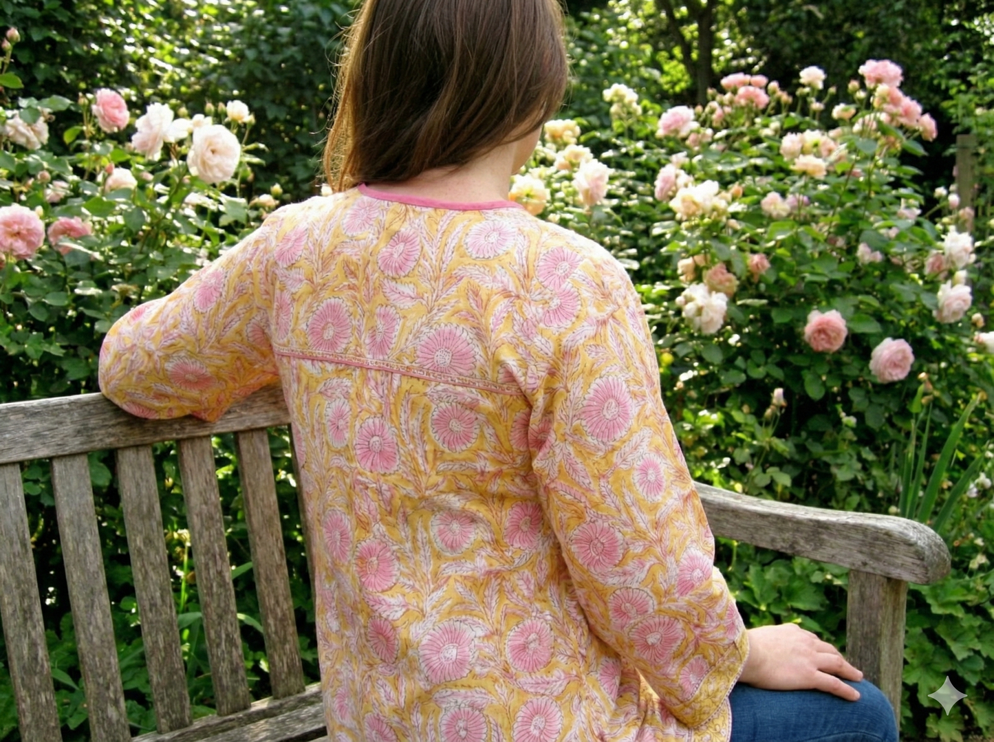 mustard blouse with pink floral pattern
