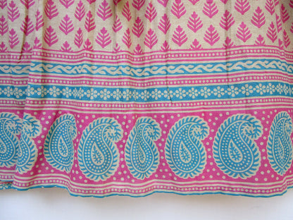 indian screen print blouse with blue paisley motifs and long sleeves