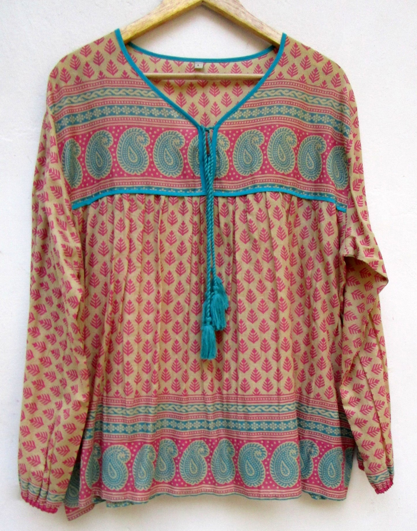 indian screen print blouse with blue paisley motifs and long sleeves