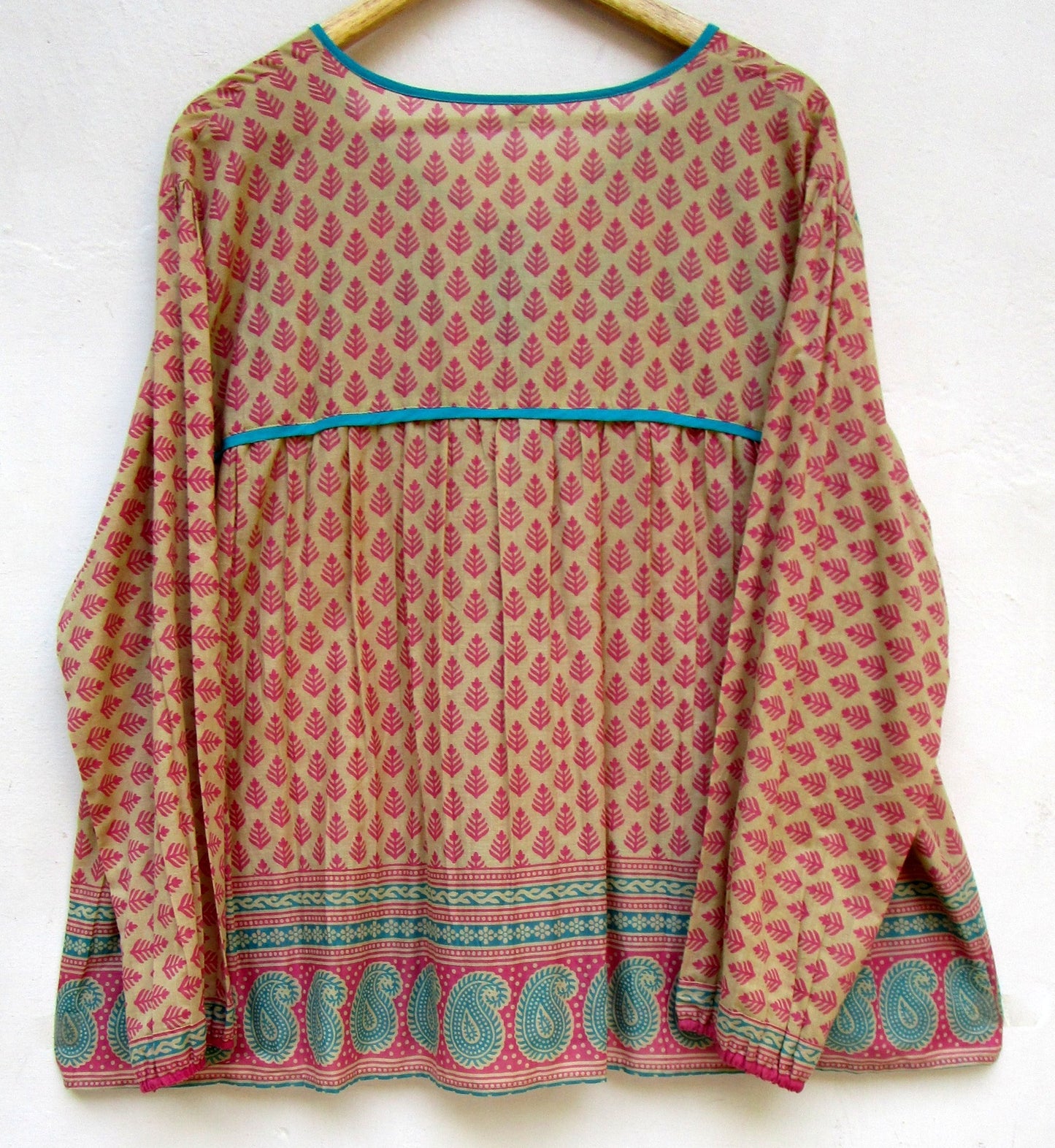 indian screen print blouse with blue paisley motifs and long sleeves