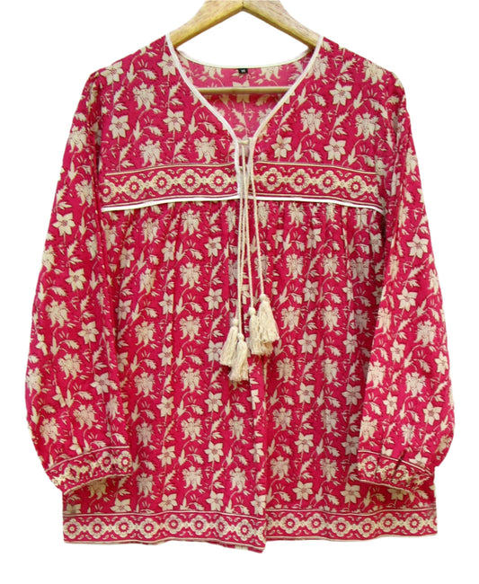 red floral womens blouse with off-white tassels.