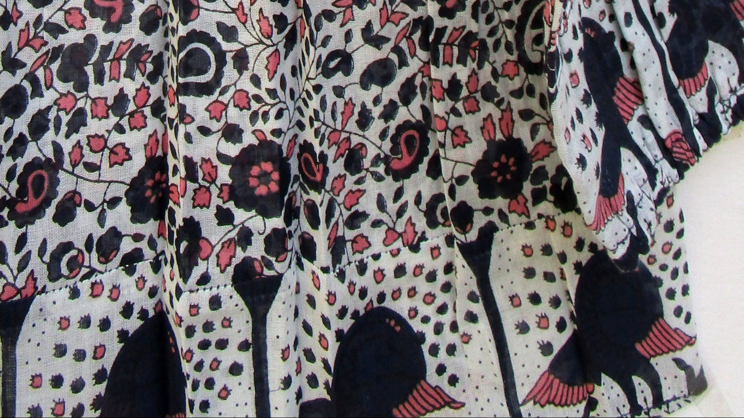 black small flower print blouse with tassels