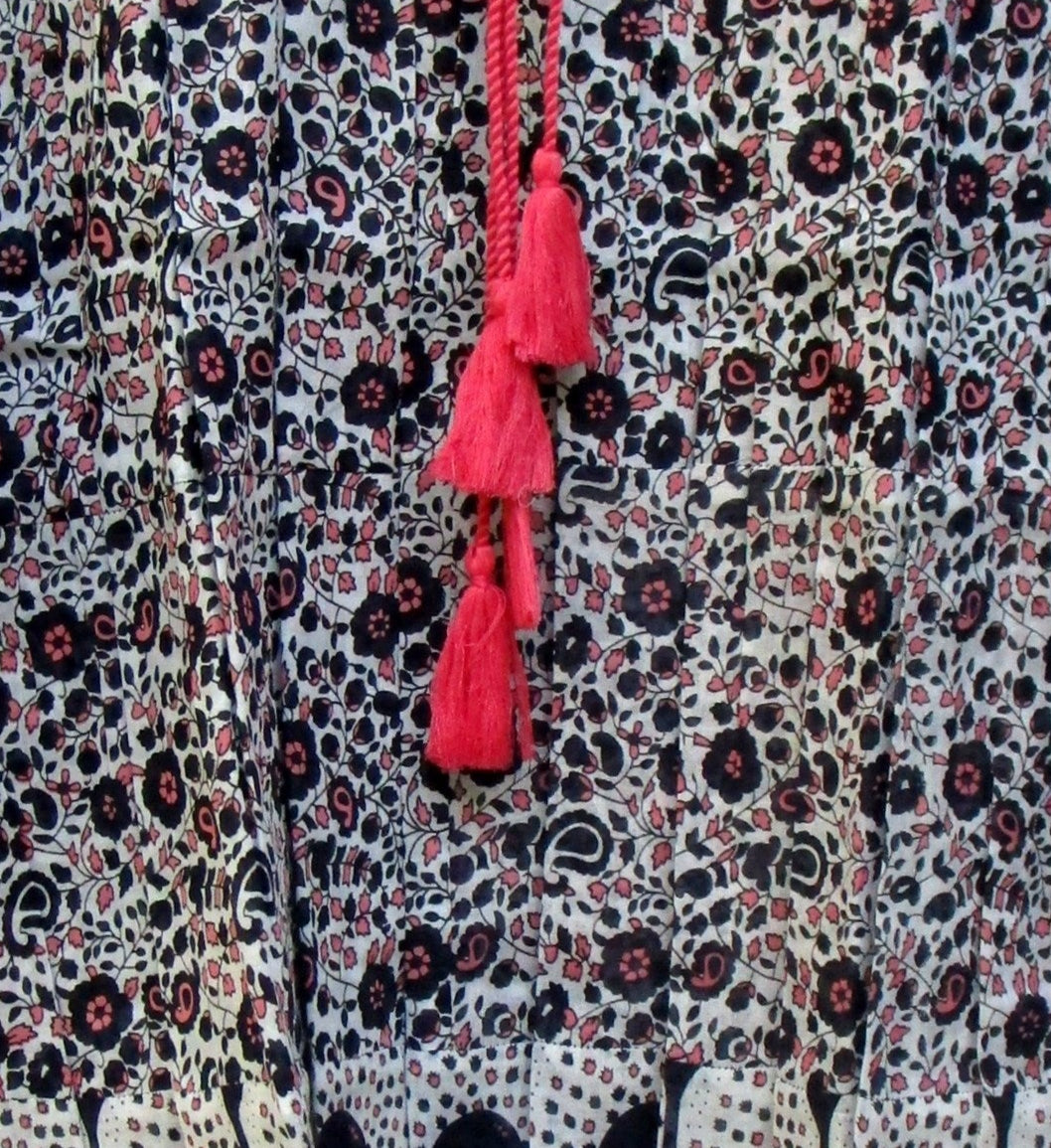 black small flower print blouse with tassels