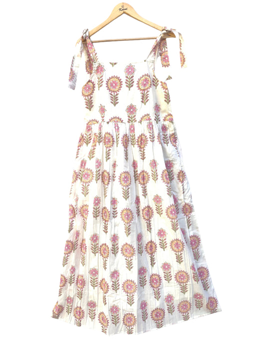 white knotty dress with big flower print in pink