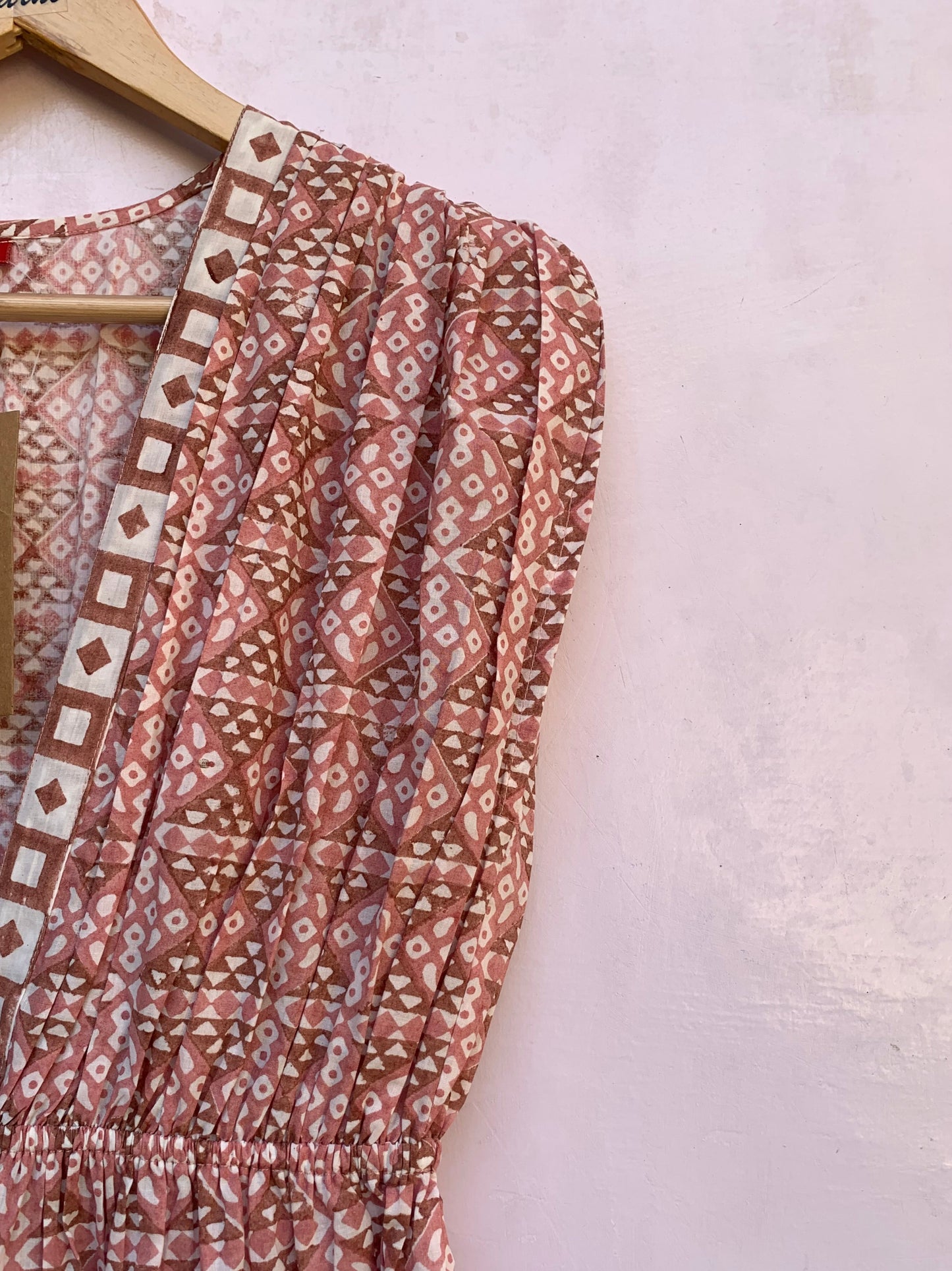 rust geometric pattern sleeveless women's jumpsuit