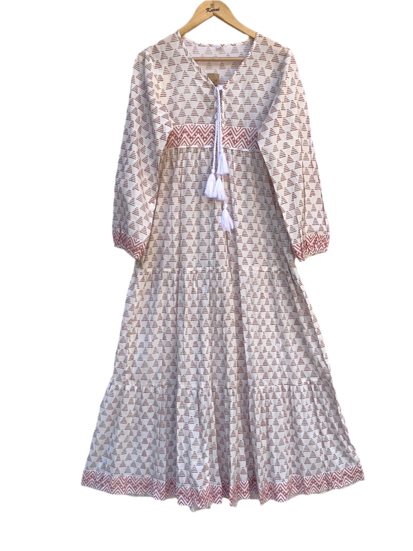 white geometric print maxi dress with tassels and long sleeves