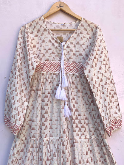 white geometric print maxi dress with tassels and long sleeves