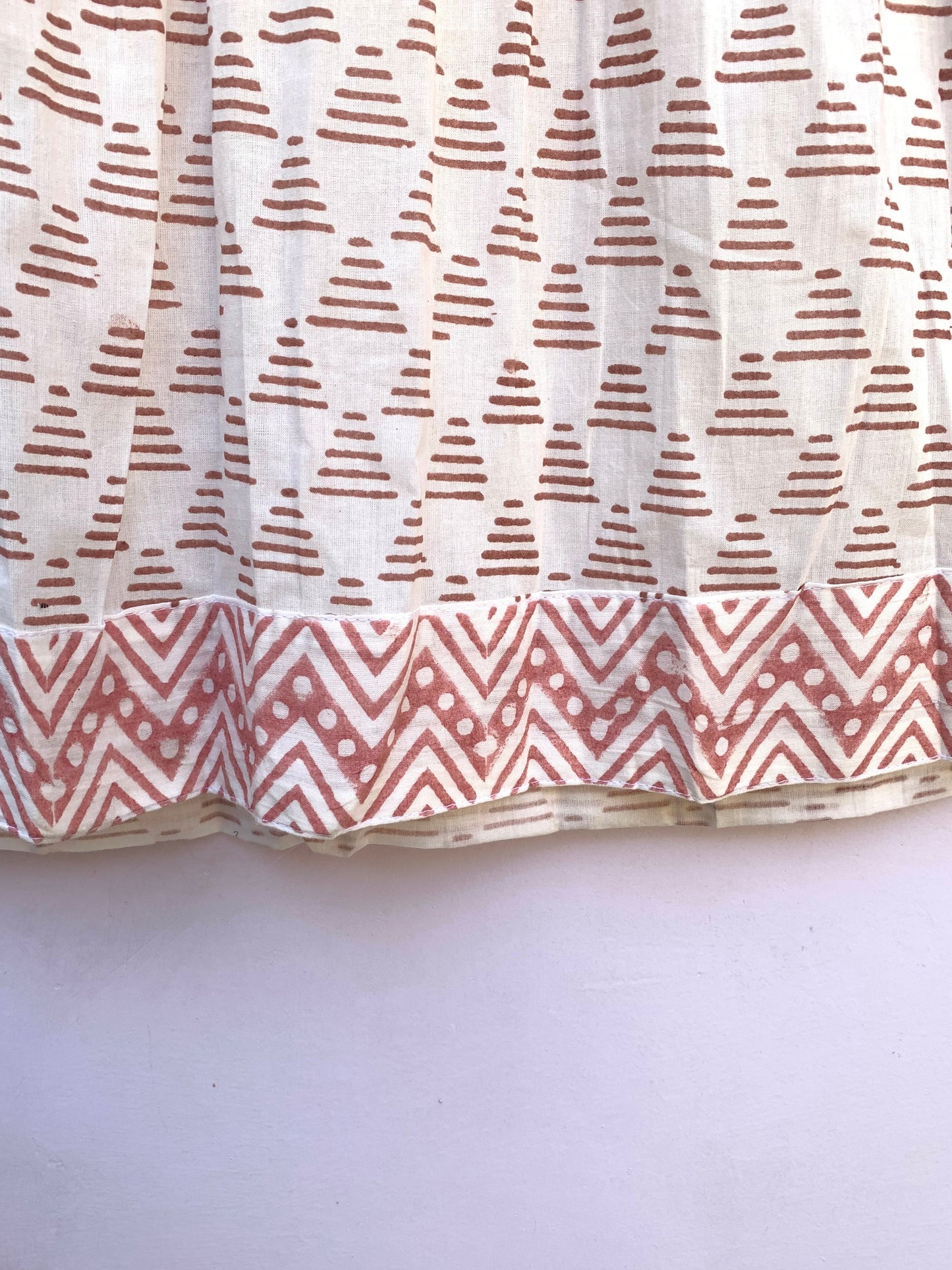 white geometric print maxi dress with tassels and long sleeves