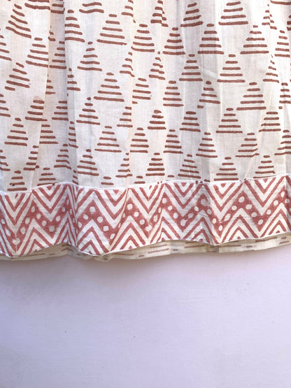white geometric print maxi dress with tassels and long sleeves