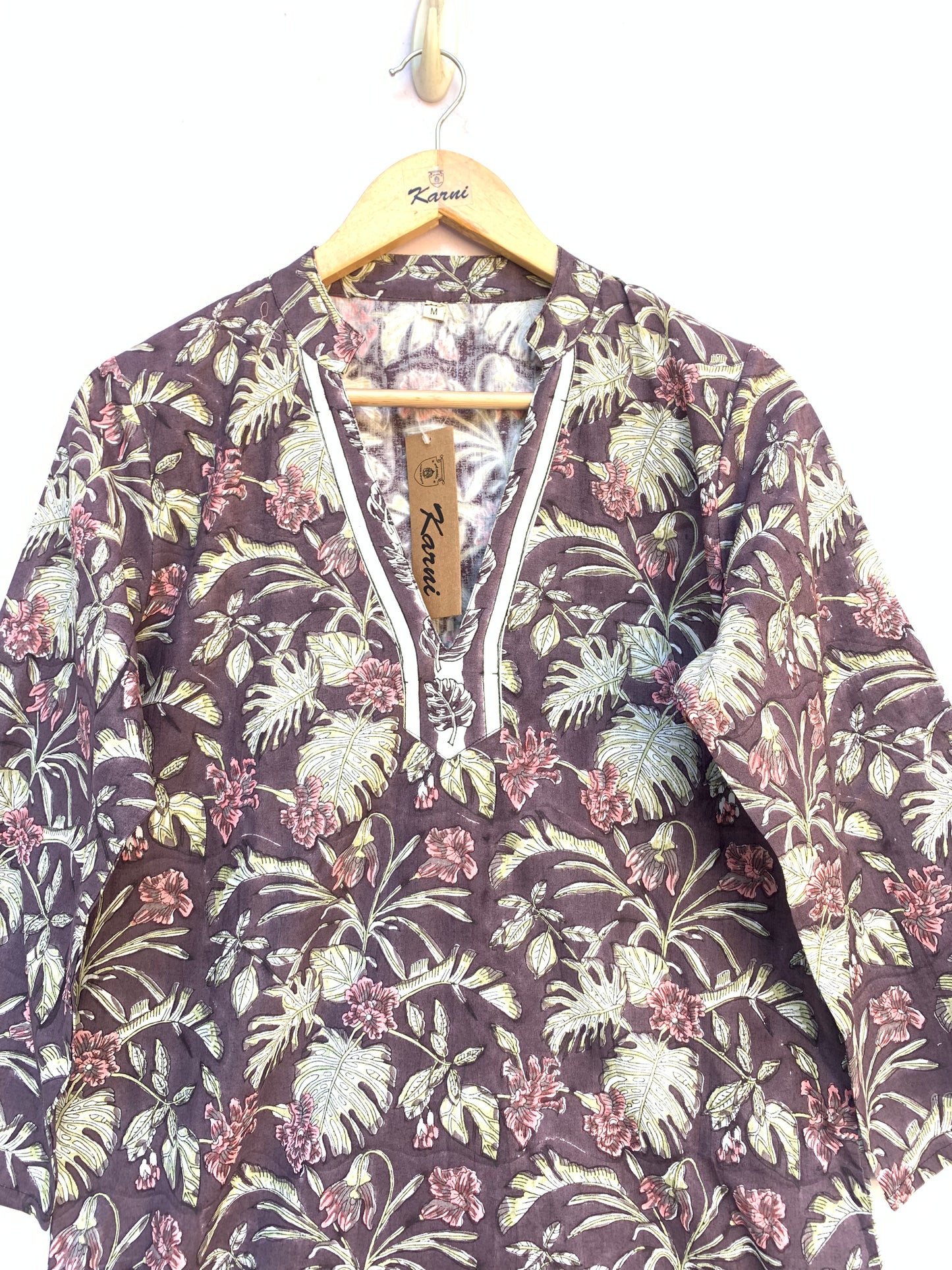 muted purple tunic with pink and green floral print