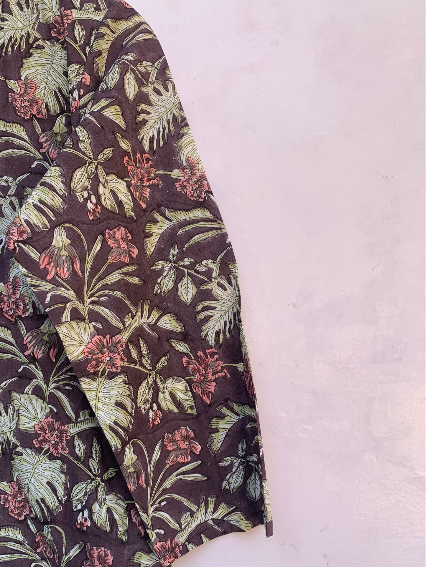 muted purple tunic with pink and green floral print