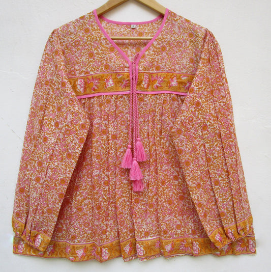 candy orange and pink floral screen printed blouse with tassels