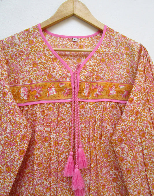candy orange and pink floral screen printed blouse with tassels
