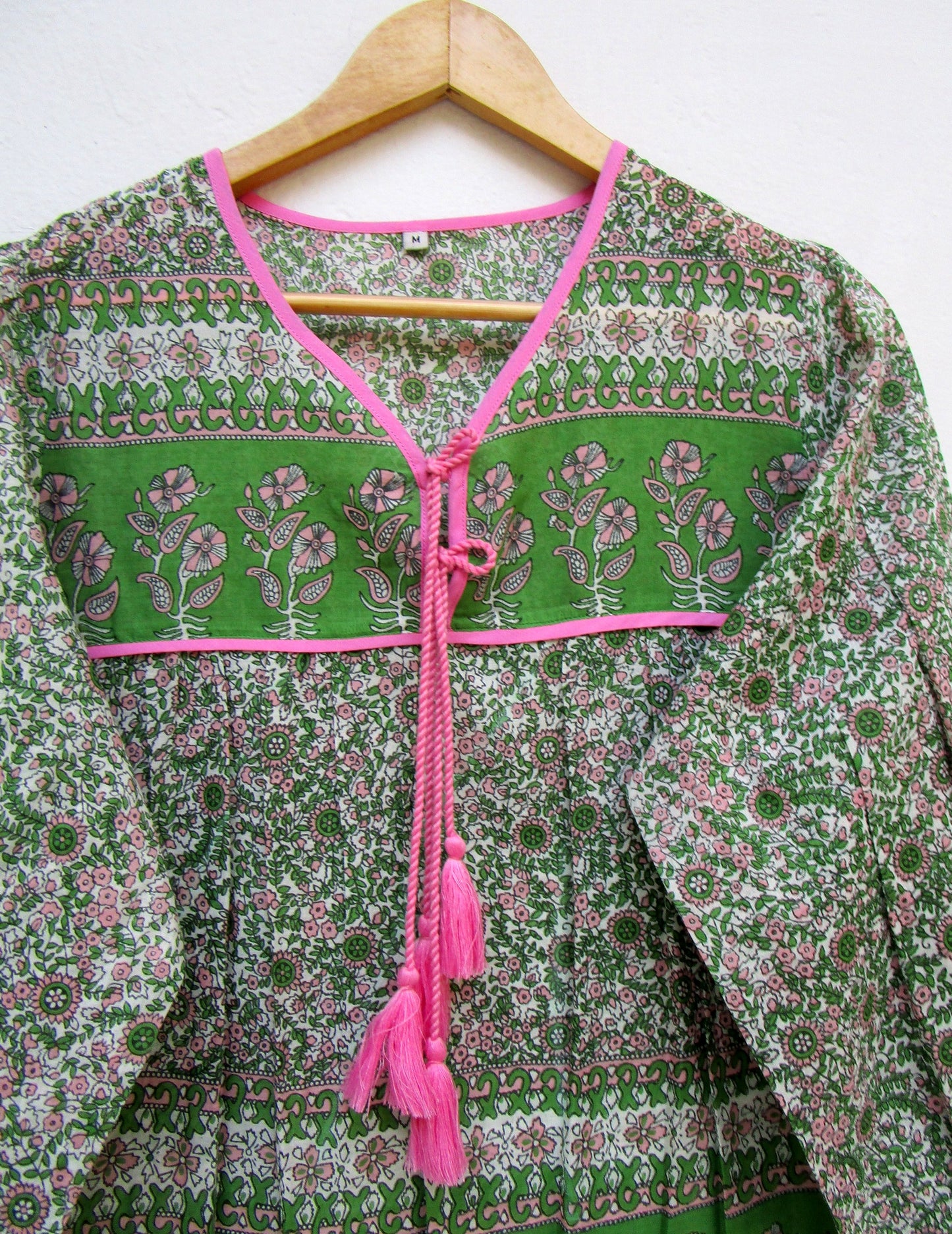 green and pink screen printed womens blouse with pink tassels