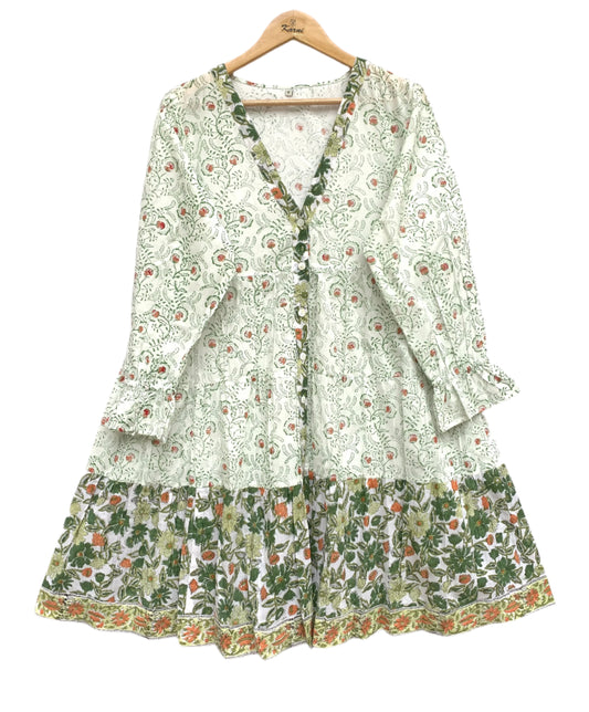 delicate green and white mini cotton dress with a vibrant border