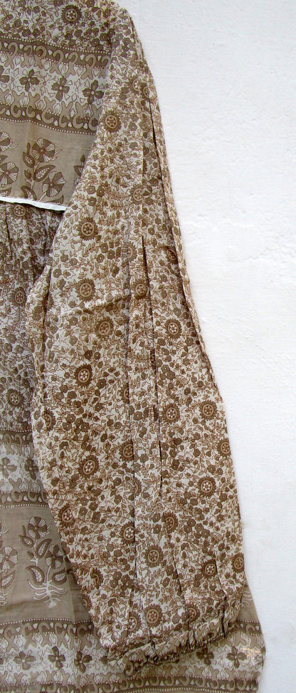 brown screen printed blouse for women with beige tassels