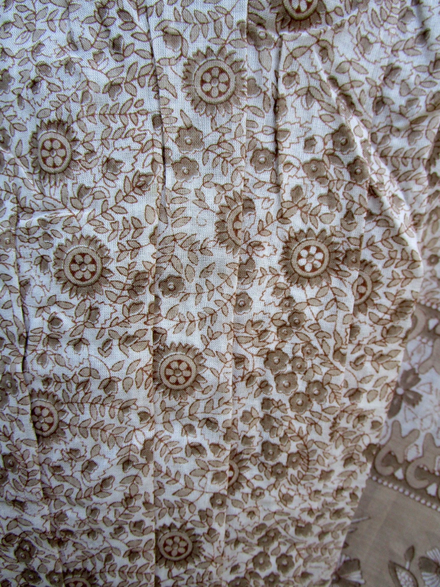 brown screen printed blouse for women with beige tassels