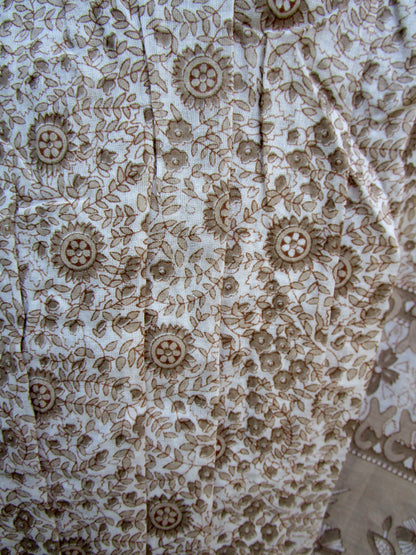 brown screen printed blouse for women with beige tassels