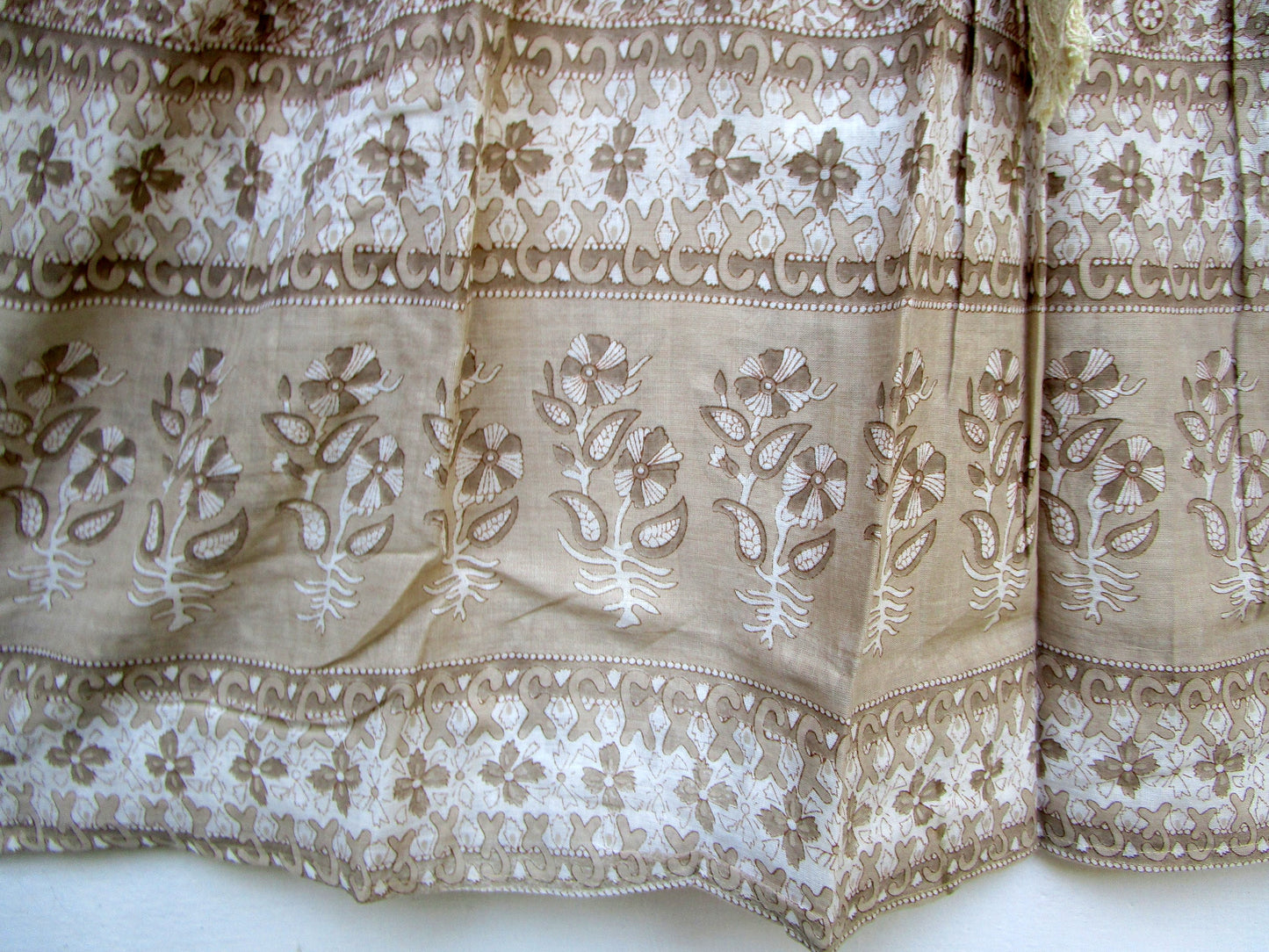 brown screen printed blouse for women with beige tassels