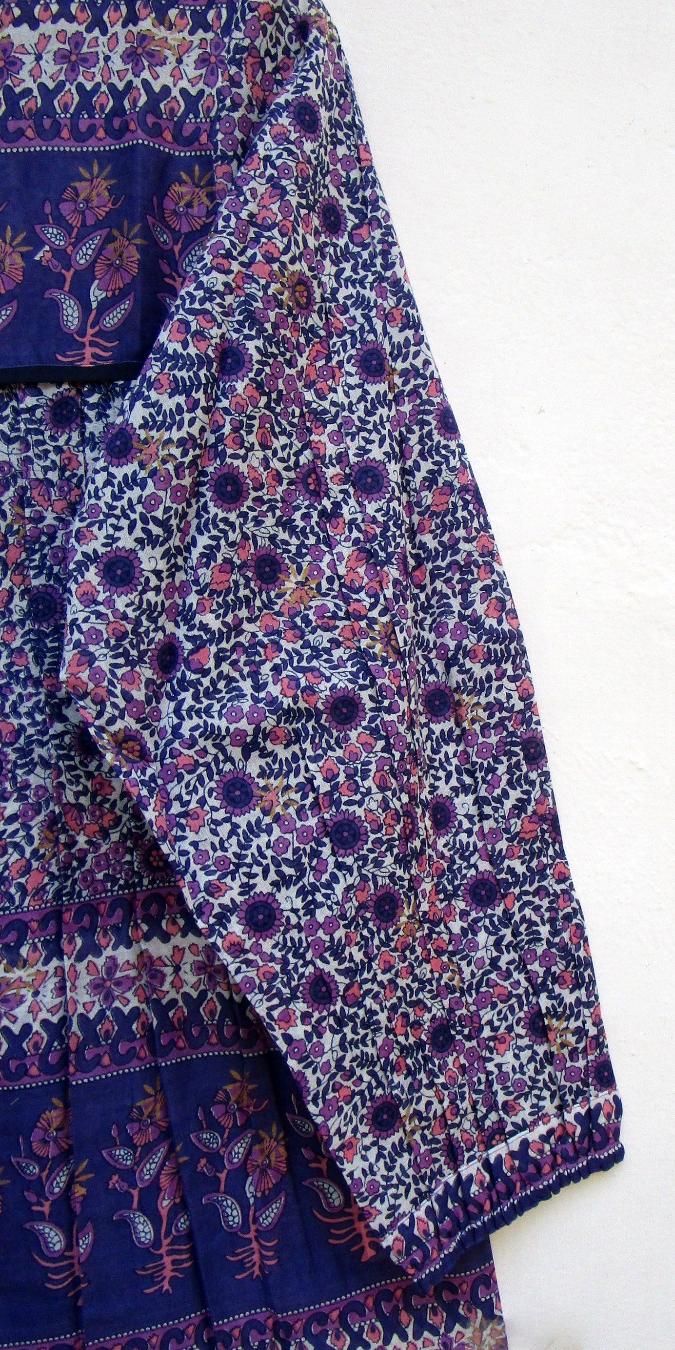 purple screen print blouse with tassels
