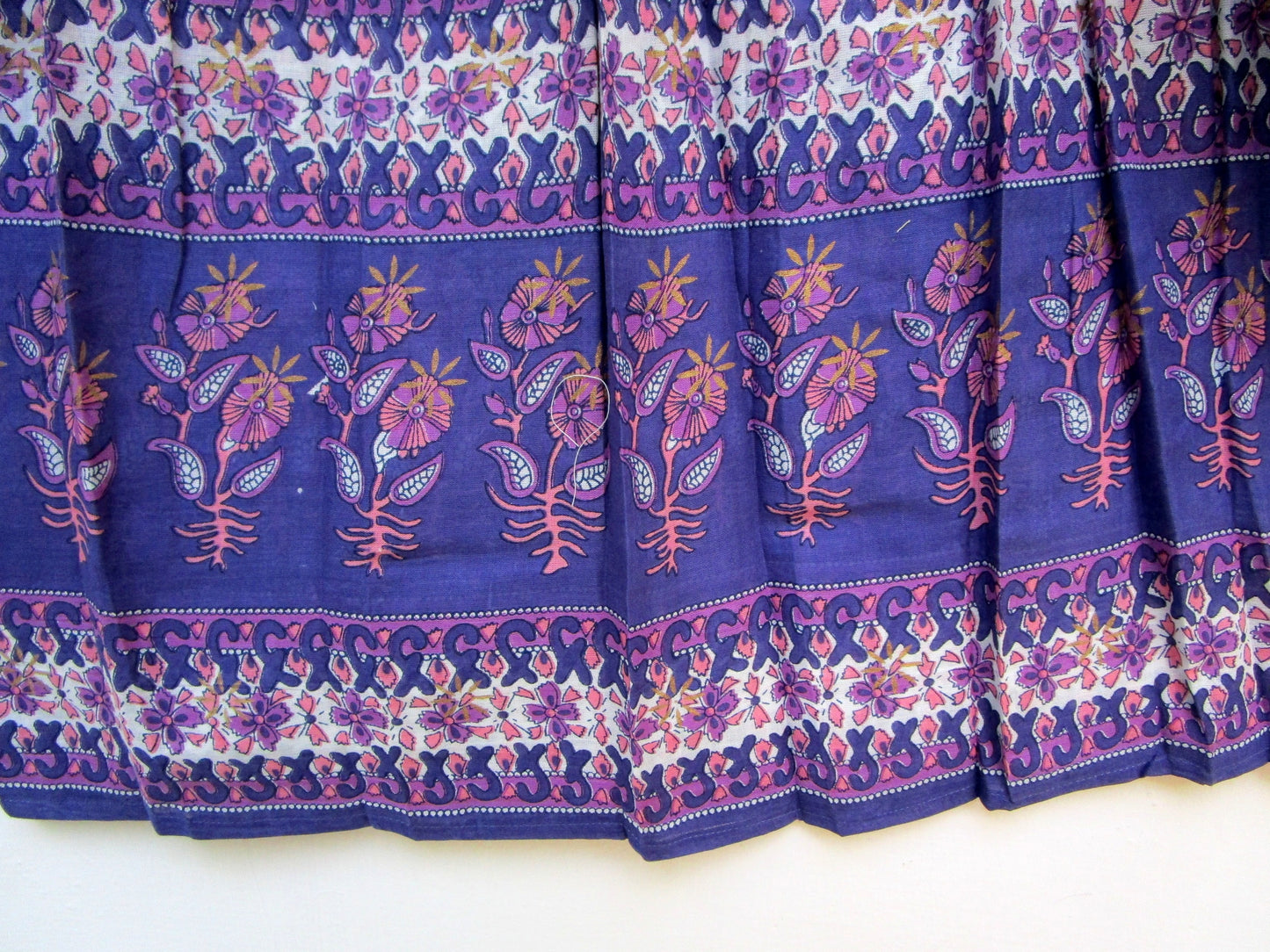 purple screen print blouse with tassels