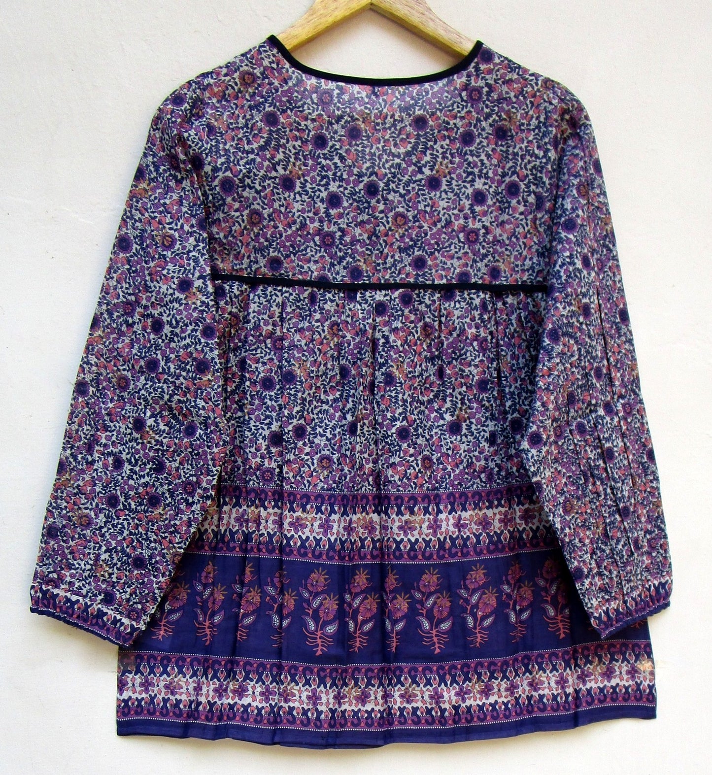 purple screen print blouse with tassels